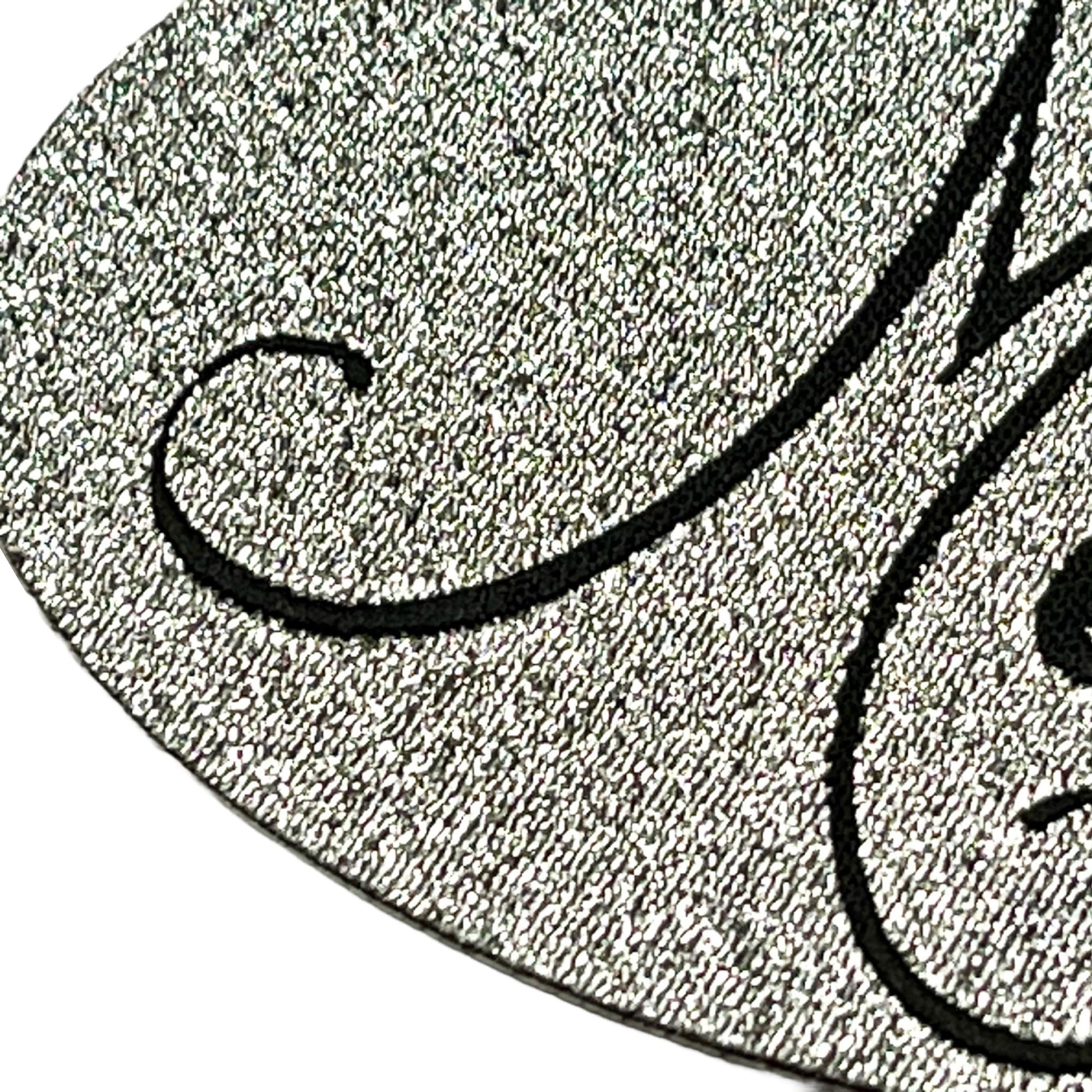 Meucci - Silver Patch Close up